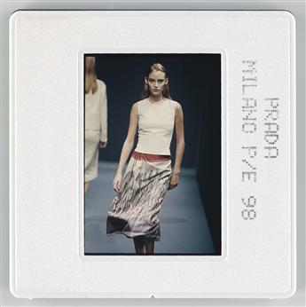 (FASHION) Two binders with a total of more than 330 color slides depicting runway shows from Prada and another with backstage shots fro